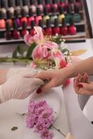 Woman hands receiving a manicure photo