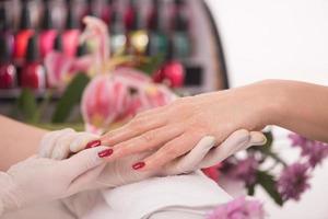 Woman hands receiving a manicure photo