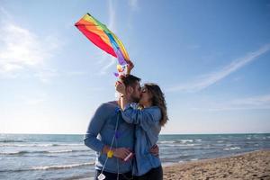 Couple enjoying time together at beach photo