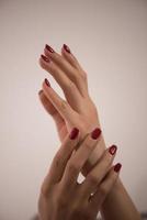 closeup of hands of a young woman photo