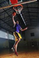 basket ball game player at sport hall photo