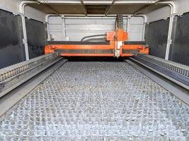 inside of empty cnc laser cutting machine - without workpiece metal sheet photo