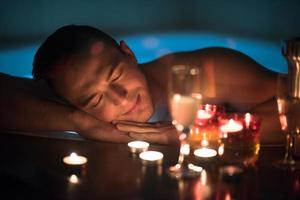 man relaxing in the jacuzzi photo