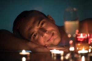 man relaxing in the jacuzzi photo