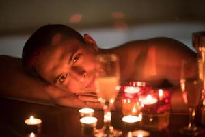 man relaxing in the jacuzzi photo