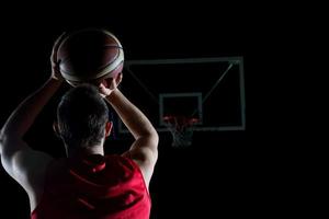 jugador de baloncesto en acción foto