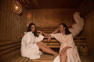 a group of young women in a sauna photo