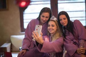 girls doing Selfy on  bachelorette party photo