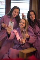 girls doing Selfy on  bachelorette party photo