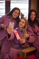 girls doing Selfy on  bachelorette party photo