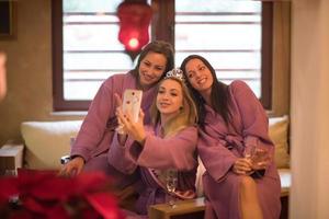 girls doing Selfy on  bachelorette party photo