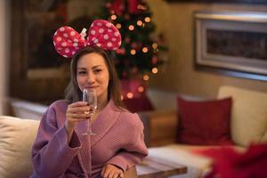 woman drinking champagne at spa photo