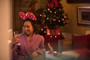 woman drinking champagne at spa photo