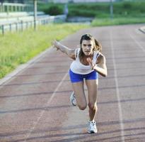 woman jogging at early morning photo