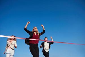 business people running on racing track photo