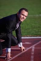 business man ready to sprint photo