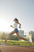 woman jogging at early morning photo
