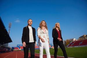 business people running on racing track photo