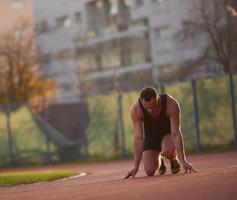 Athletic man start photo