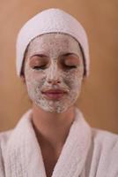 Spa Woman applying Facial Mask photo