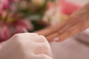 Woman hands receiving a manicure photo