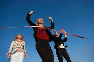 business people running on racing track photo