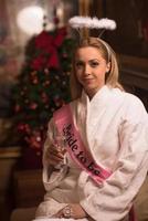 woman drinking champagne at spa photo