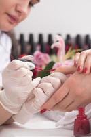 Woman hands receiving a manicure photo