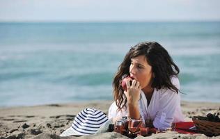 happy young woman on beach photo