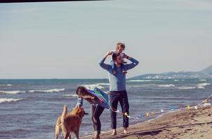 happy young family enjoying vecation during autumn day photo