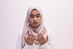 female muslim praying with opend hands photo