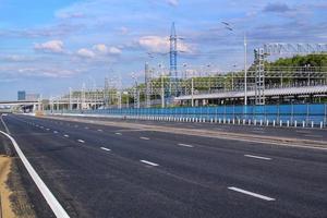 New traffic intersection road construction site. Development of Transport infrastructure junction, improvement highway. Overpopulation problem. Erection overpass of northeast chord in Moscow, Russia photo
