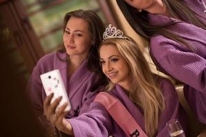 girls doing Selfy on  bachelorette party photo