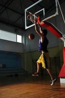 basket ball game player at sport hall photo