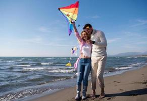 Couple enjoying time together at beach photo