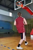 basket ball game player at sport hall photo