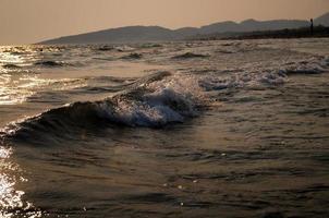 puesta de sol en el mar foto