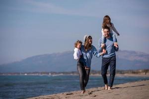 Young family enjoying vecation during autumn photo