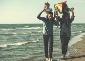happy family enjoying vecation during autumn day photo