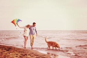 happy couple enjoying time together at beach photo