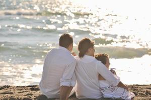 happy young  family have fun on beach photo