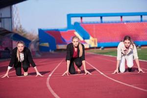 mujer de negocios lista para correr foto