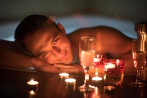 man relaxing in the jacuzzi photo