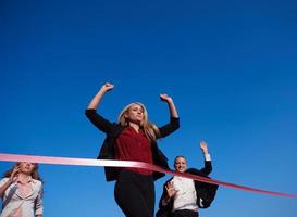 business people running on racing track photo