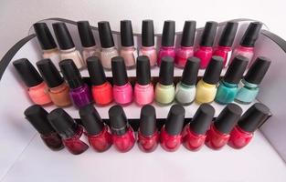 Set of different bottles of nail polish photo