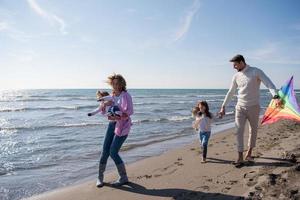 happy family enjoying vecation during autumn day photo