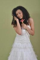 Portrait of a beautiful woman dressed as a bride photo