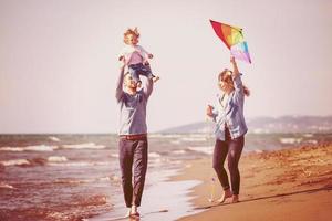 happy family enjoying vecation during autumn day photo