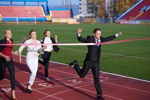 business people running on racing track photo