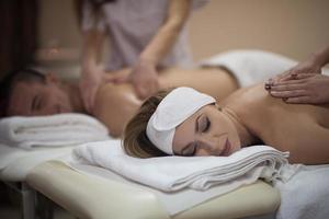 couple receiving a back massage photo